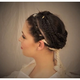 Illustration for article titled Ancient Roman Vestal Virgin hairstyle re-created for very first time